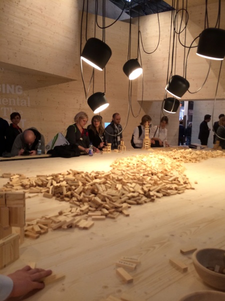 Once inside, visitors are met with a large central table piled high with thousands of small wooden blocks printed with words, with which people make stacked structures, and then knock them down. The title of the exhibit is UNDO, referring to the the iterative process of design in which doing and undoing are necessary to bring the design forward, never to perfection, but closer and closer to it. Good stuff. http://www.d-art-design.de